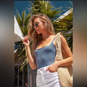 Danyelle Blue Ribbed Sleeveless
Bodysuit
Color: Blue